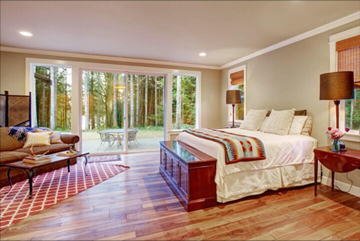 modern bedroom guestroom with patio doors